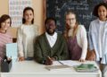 Cheerful teacher and students portrait