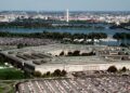 Aerial view of the Pentagon with the Washington Monument in the background