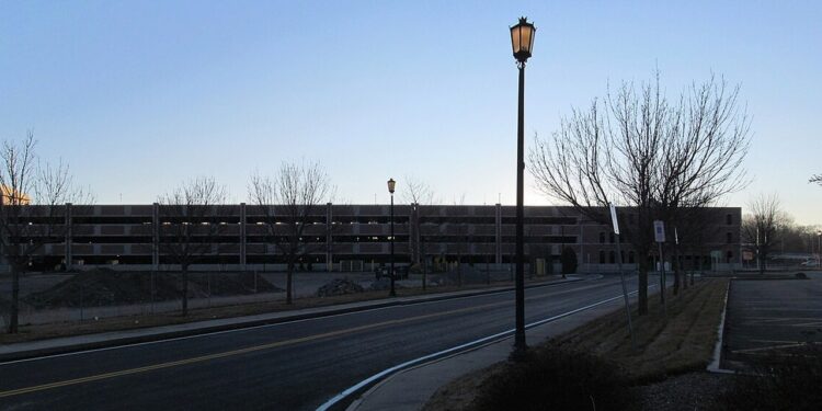 A plain multi-level concrete parking garage