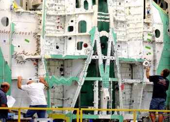 Lockheed Martin plant workers assemble an F-35 fuselage at the Fort Worth, Texas production facility