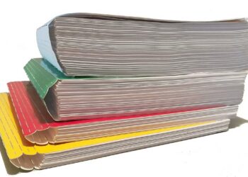 A stack of paperwork and files