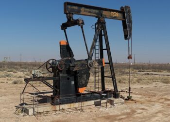 An oil pumpjack at work in an oilfield